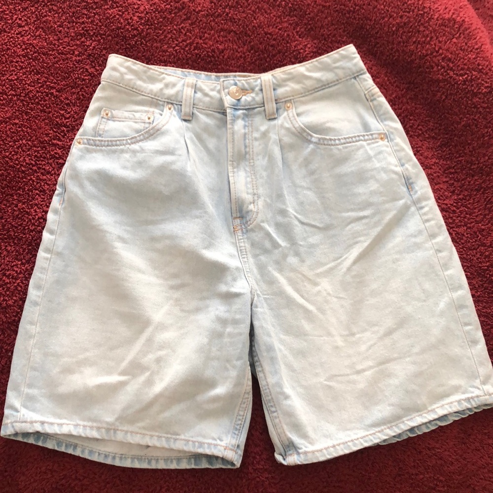 H&M brand high-waisted light denim jean shorts.
